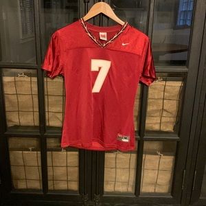 Nike nylon maroon v-neck with short sleeve jersey. Size Medium